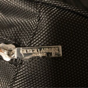 Giorgio Armani toiletry bag.